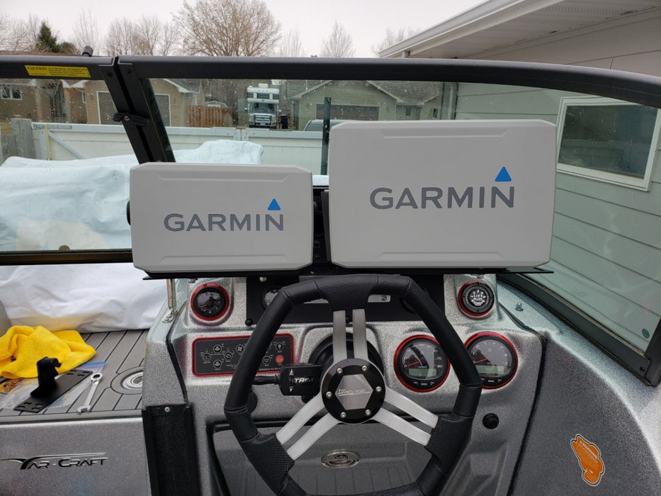 Yarcraft 219 Walleye boat with two Garmin fish finders mounted on the dash.